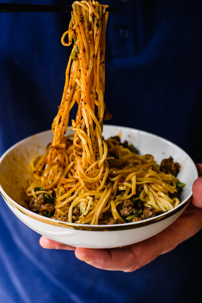 Dan Dan Noodles: Spicy Szechuan Noodles with Chili Oil, ground beef (or ground pork) and topped with green onions.