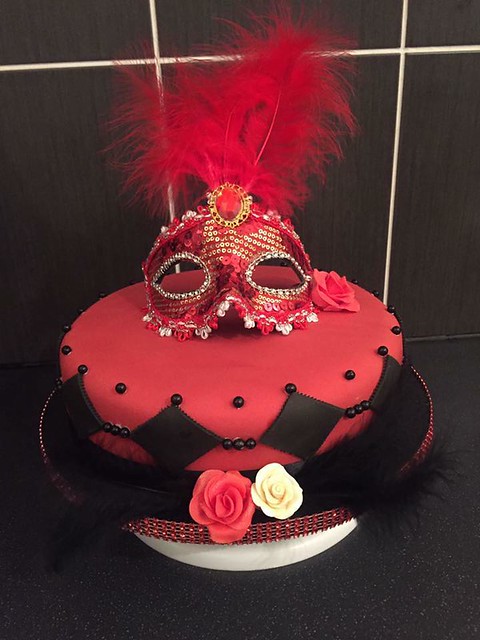 60th Birthday Cake with a Masquerade Ball Theme by Lisa Rowe of Pretty Petals. Flowers by Design-Lisa Rowe