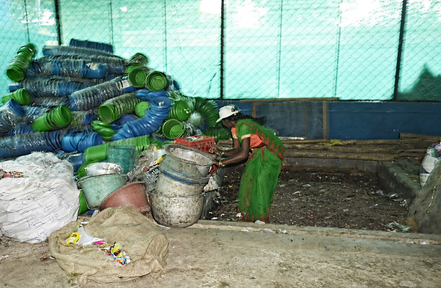 An SHG worker near the organic manure from the household waste.