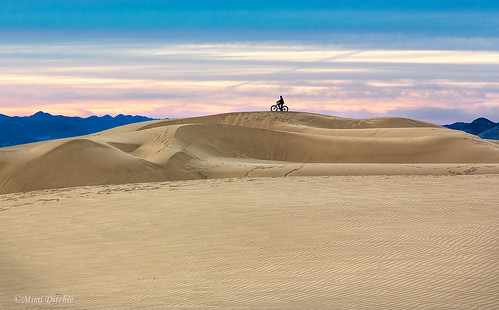 oceanodunes dunes sanddunes bike bikerider sand sandpatterns clouds getty gettyimages mimiditchie mimiditchiephotography