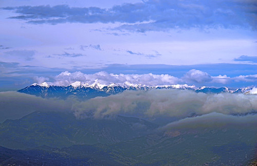outdoor mountain alpenglow telephoto clouds hights pentaxk1 ricohimaging landscape nature vividcolours sky land snow blue geen magenda white cliffs canyon ridge