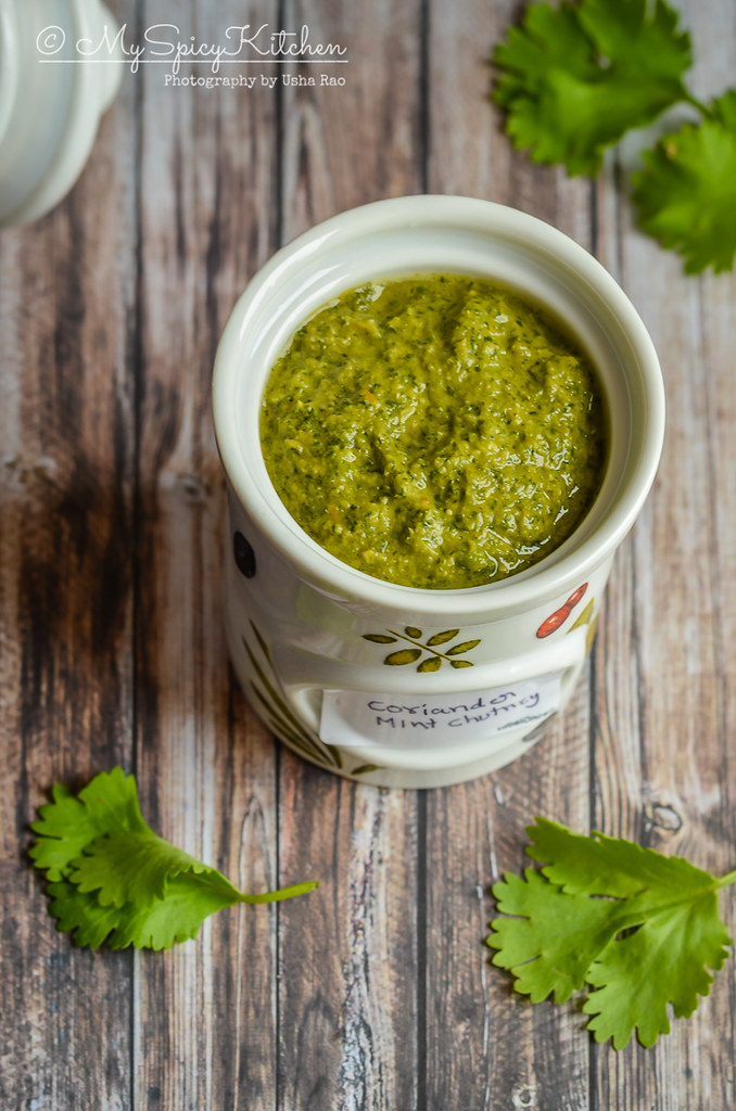 another angle of jar of coriander mint chutney.