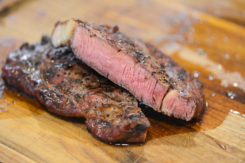 Grilled Ribeye with Herbed Brown Butter Sauce