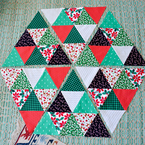 Sew 6 larger triangles. We'll attach flange next.