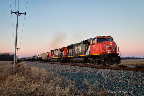 cn canadian national ohio csx k train ethanol tank evening sunset red pink emd sd70i locomotive railroad rail road rails toledo subdivision winter rural america