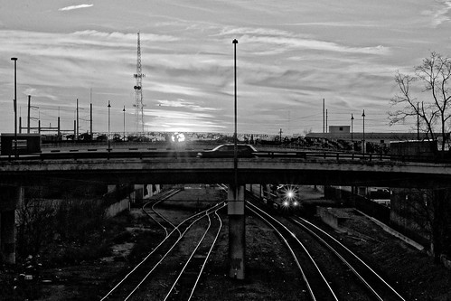 d90 sigma1770os train sunset overpass starburst f22 tracks tulsa downtown sun blackandwhite ononesoftware on1photoraw2018 topazdenoise dxofilmpack5
