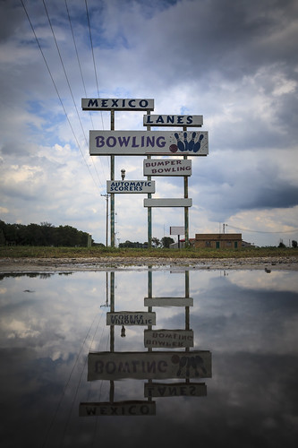 signs sign water reflection reflect missouri mexicomissouri mexico 2010 summer august clouds sky cloudysky mexicolanes lanes bowlinglanes bowlingalley bowlingalleysign