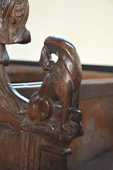 bench end: unicorn scratching its behind (15th Century)