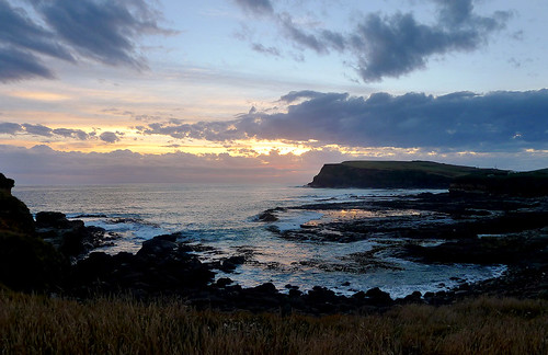 curiobay bay cliffs southland newzealand waves sunset evening camping