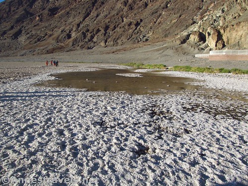 Water on the salt flats at Badwater Basin in Death Valley National Park, California
