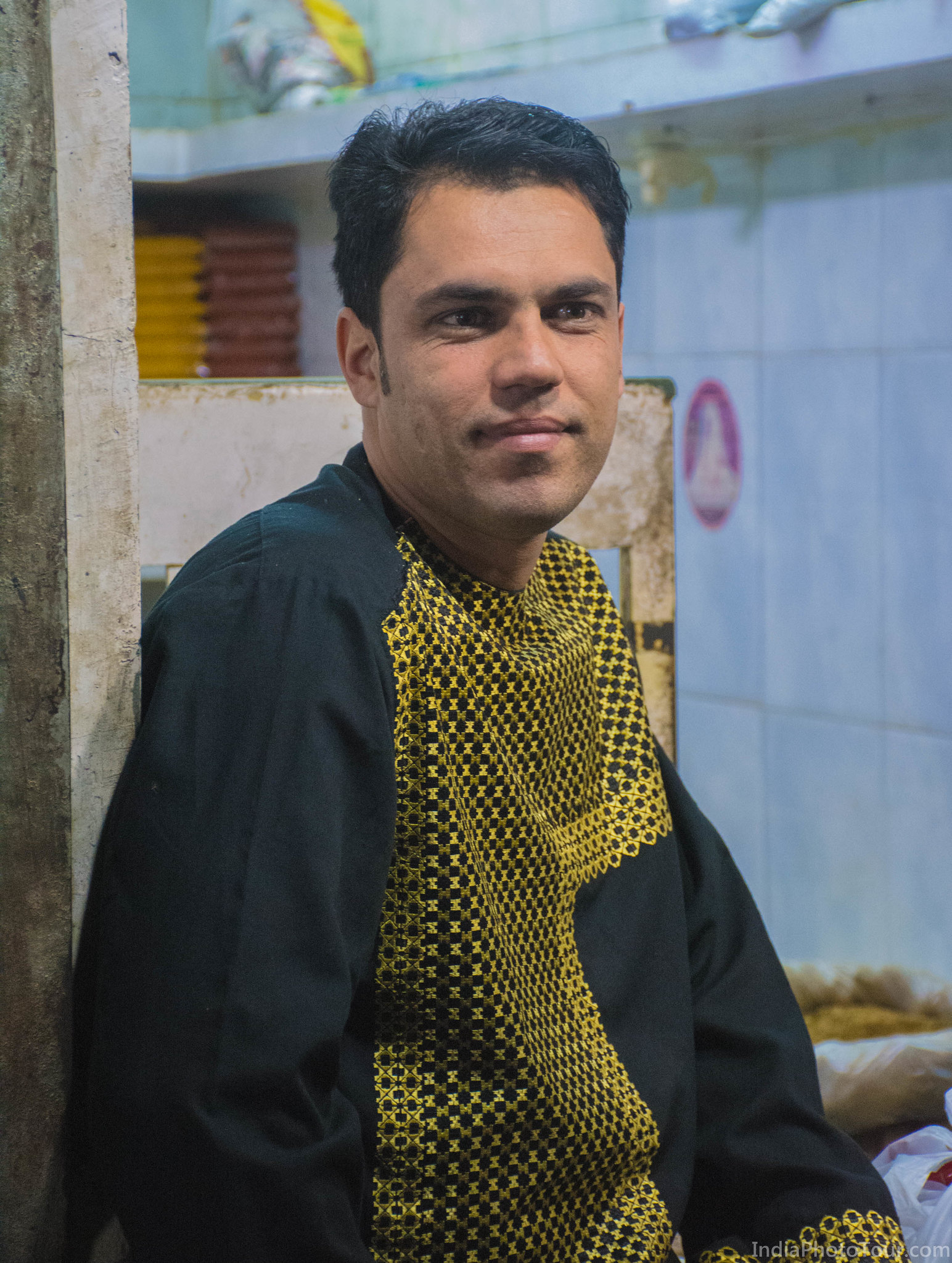 A trader from Afghanistan in spice market who wanted us to take his picture