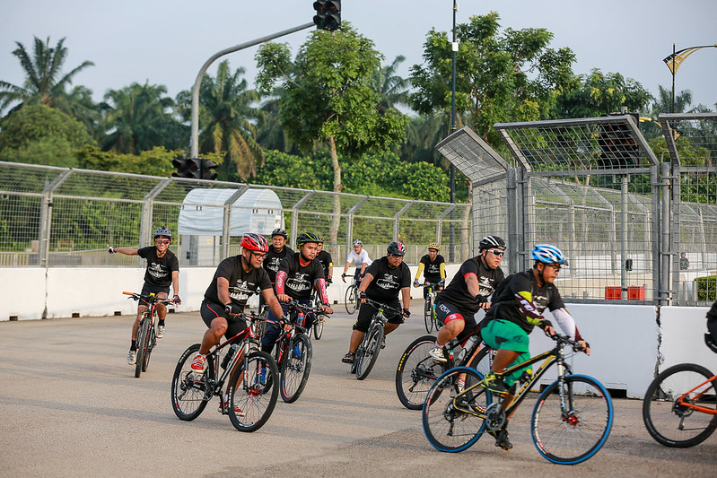 Crowd Is Happily Cycling On The Race Track