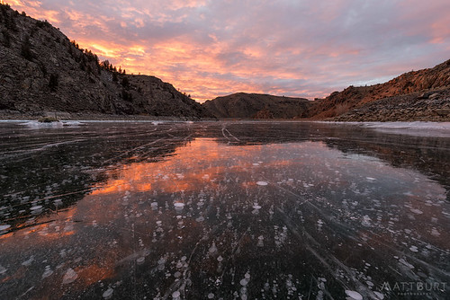 bubbles cracks gunnisonrivercanyon ice reflection sunset