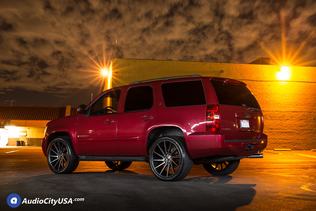 2007 Chevy Tahoe on 24x10 DUB Wheels S128 Chedda black double tint face. 