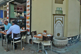 Istanbul - Street scene fountain by restaurant