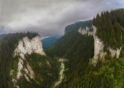 zanoaga gorge romania canyon bucegi mountains carpathians aerial drone nature outdoors storm rocks cliffs path trail forest trees park heights drops clouds