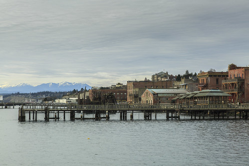 waterfront porttownsend washington pugetsound architecture landscape seascape clouds cloudy overcast victorian piers olympic mountains water sky city cityscape horizontalimage color buildings historical