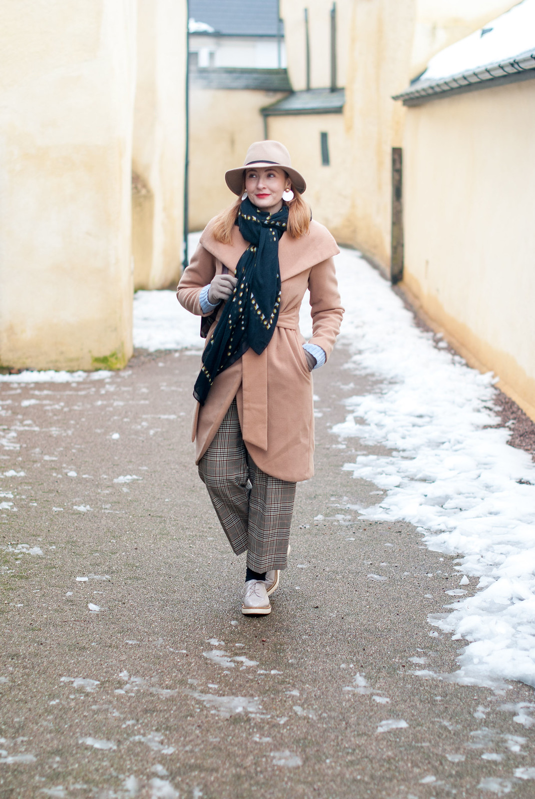 How to Stay Smart and Stylish in the Snow \ winter wear \ winter dressing \ camel wrap coat \ camel fedora hat \ wide leg crop Prince of Wales check trousers \ heritage check pants \ taupe flatform lace-ups | Not Dressed As Lamb, over 40 style