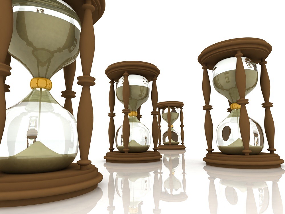 dramatic image of four hourglasses representing practice time