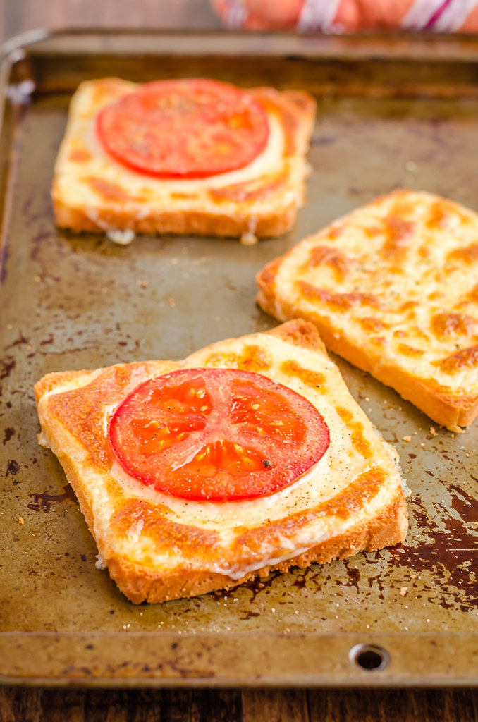 3 Ingredient tomato cheese toast in a baking sheet