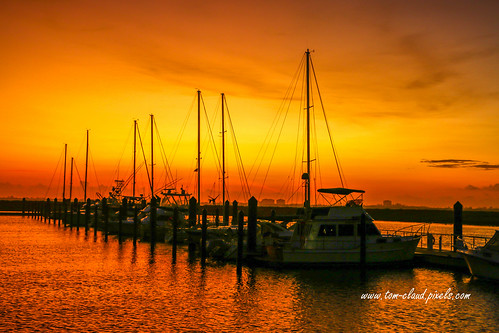 sun sunrise colorful skymorning dawn marina boats docks sailboats mast weather downtown fortpierce florida usa