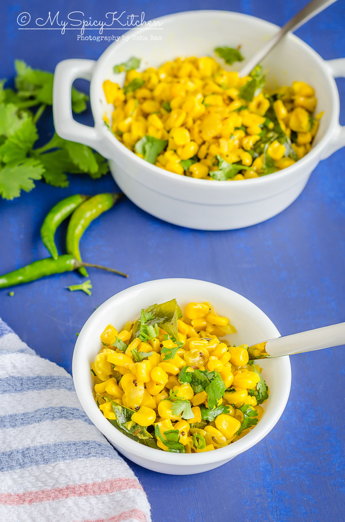 Bowl of sauteed sweet corn kernels in the forefront and a casserole of sauteed corn in the back