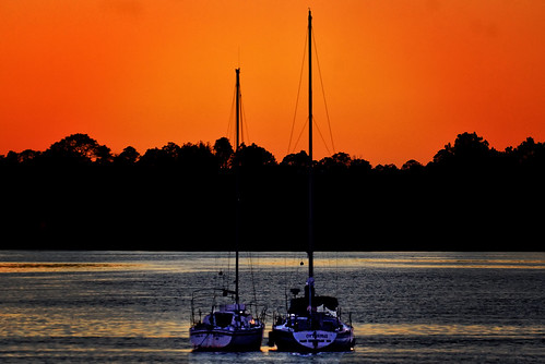 sailboats sail sunset orange water river nature outdoors carrabelle carrabelleriver