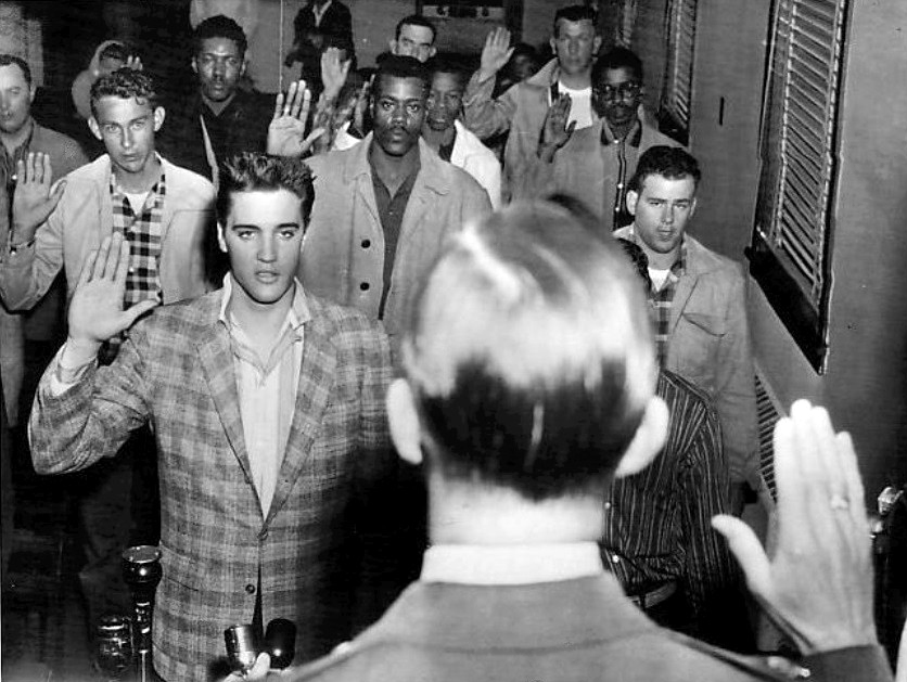 Elvis Presley being sworn into the U.S. Army at Fort Chaffee, Arkansas, March 24, 1958.
