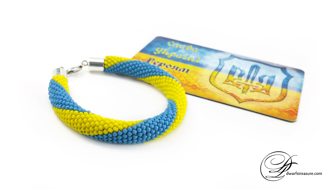 Pretty striped blue & yellow beaded glass statement bracelet