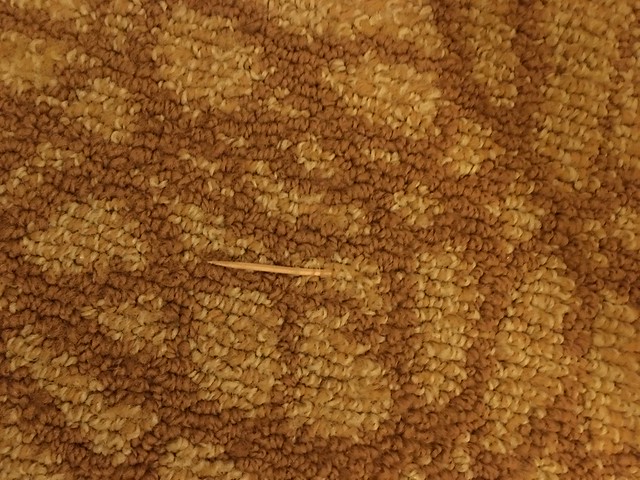 Bellagio,  toothpick imbedded in the carpet
