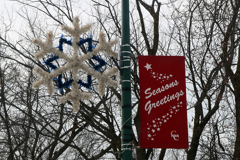 six-pointed white snowflake with a blue star center