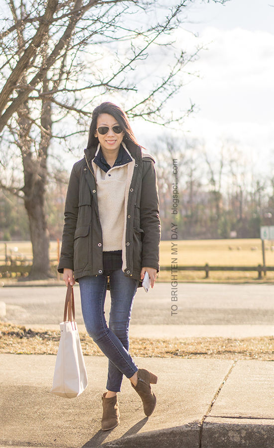 olive green parka, fleece pullover, black watch plaid button up, skinny jeans, canvas tote, suede ankle boots