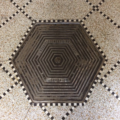 lapiscine roubaix museum iron hexagon tiles detail granolithic mosaic patterns