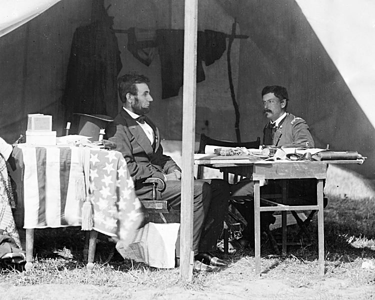  Abraham Lincoln and George B. McClellan in the general's tent at Antietam, Maryland, October 3, 1862.