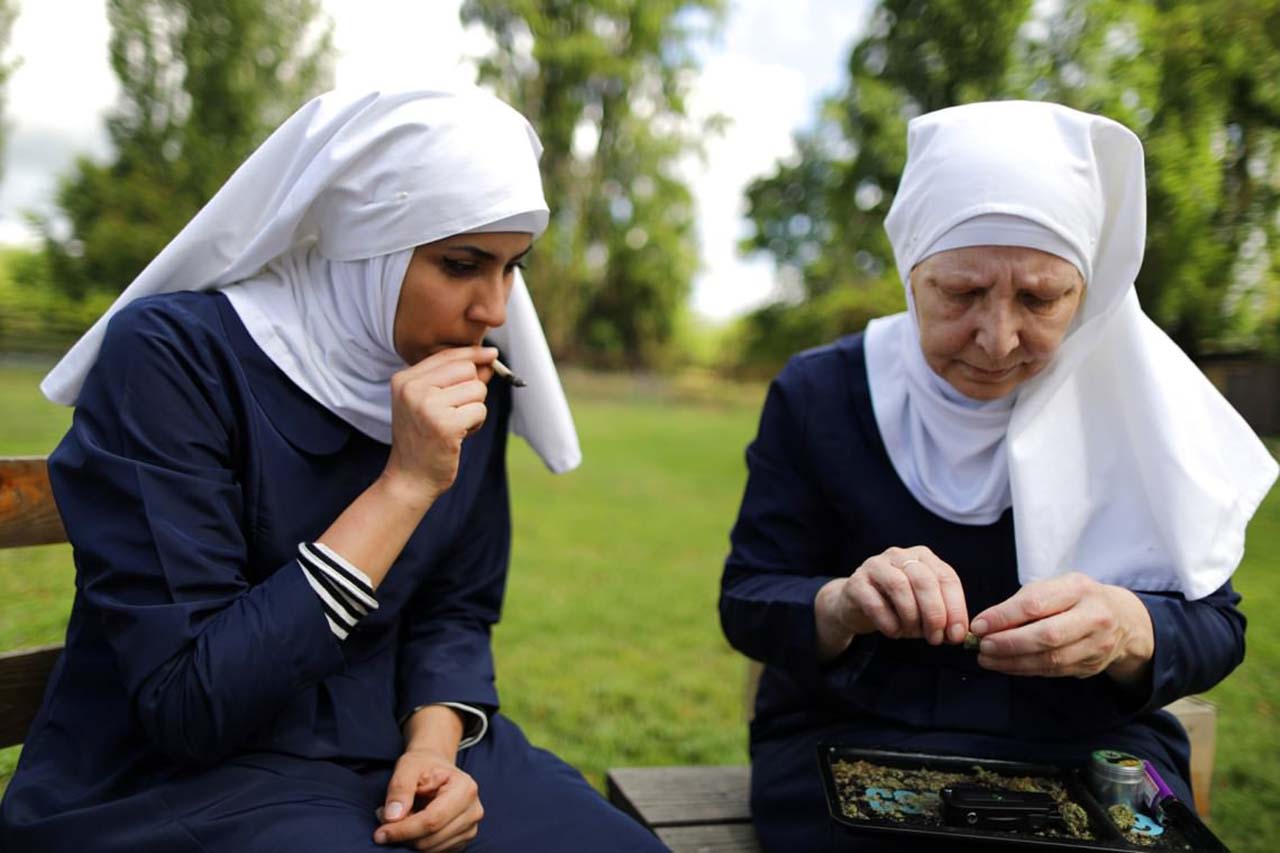 22 Photos From 2017 That Tell A Story: India Delgado (left), goes by the name of Siter Eevee and 57-year-old Christine Meeusen, also goes by of weed nun, smoking a joint at Sisters of the Valley near Merced, California.