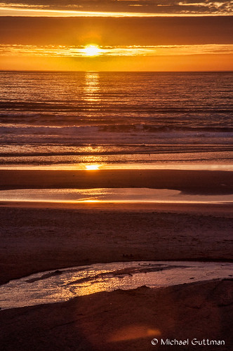 oregoncoast newport oregon coast beach sunset ocean sea waves water sun sunsetcolors sand reflections layers lines clouds sky nikon d90