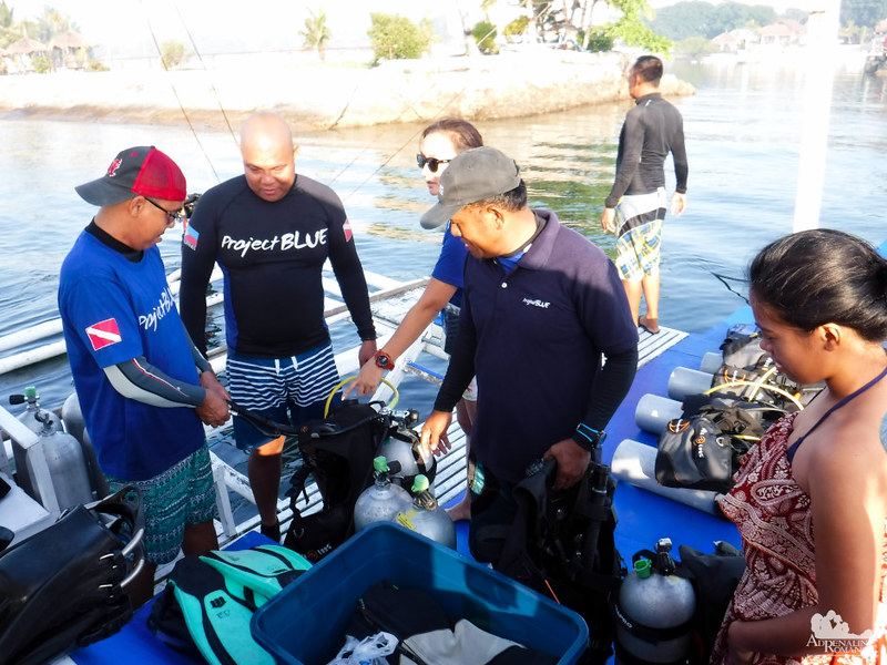 Loading our boat with scuba gear