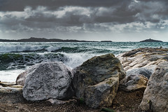 Stones and stormy Sea