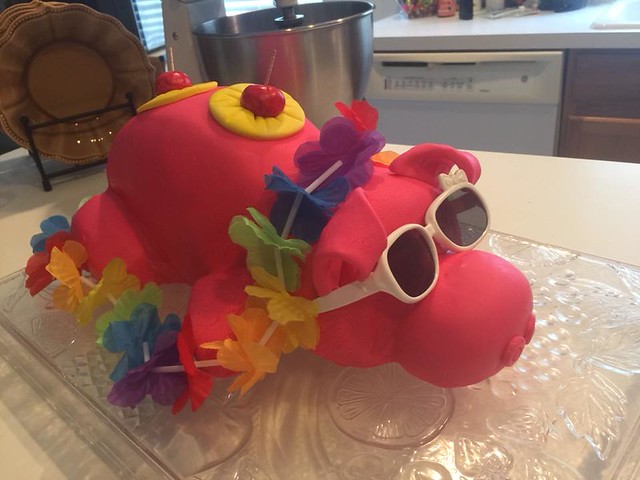 Made for a child’s Luau Birthday Party. First time I used fondant on an entire cake. Made from 3-9” round cake pans, Vanilla cake, Vanilla Buttercream and yes, Vanilla Fondant by Rhonda Braun