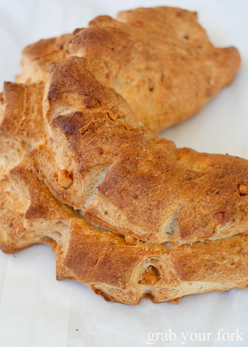 Rosca de chichiarrones bread with pork crackling at Uruguayan bakery cafe Confiteria Lion D'Or in Carramar