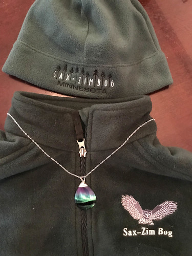 Vest, hat, and necklace for the fashionable birder