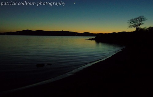 sunset light lake loughswilly donegal ireland buncrana landscape seascape inishowen ulster countydonegal sun rocks beach