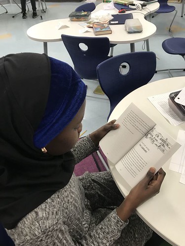 girl reading The Boy Who Harnessed the Wind