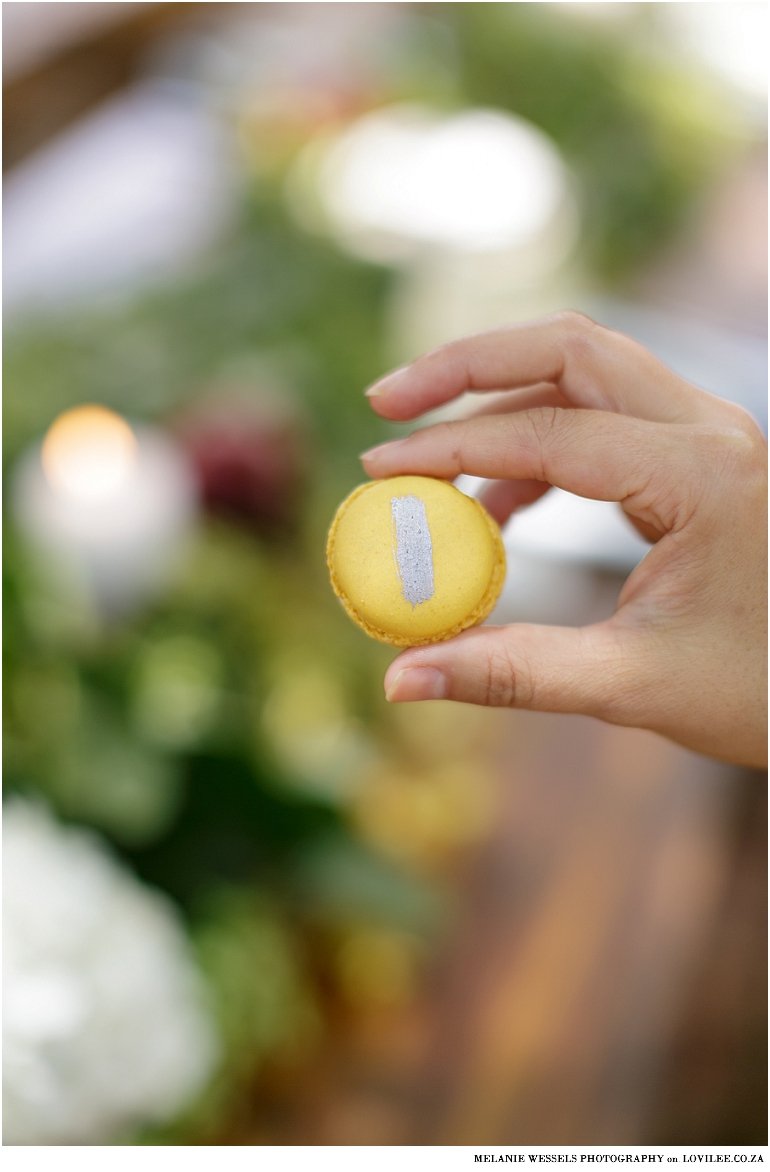 mustard colour macaroon with silver stripe decoration
