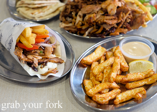 Pork yiro, mixed yeeros plate and haloumi fries at Yiro Yiro Greek kebab shop in Belmore
