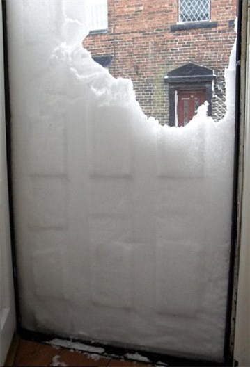 Wall of snow after opening the front door