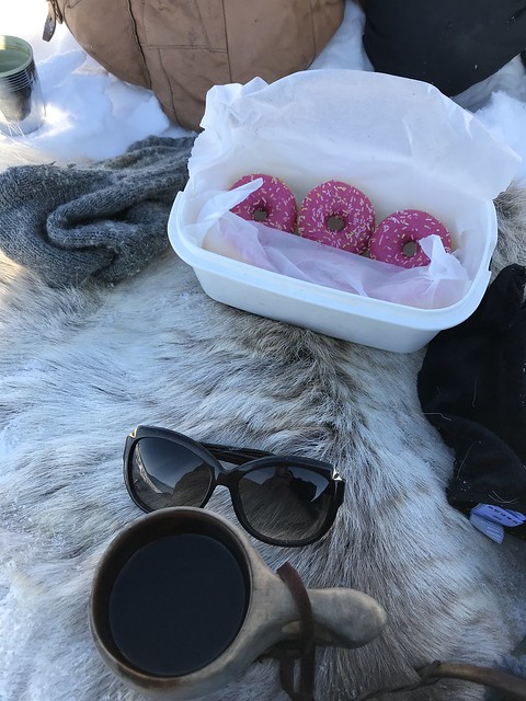 Ice fishing, hot tea and sunglasses