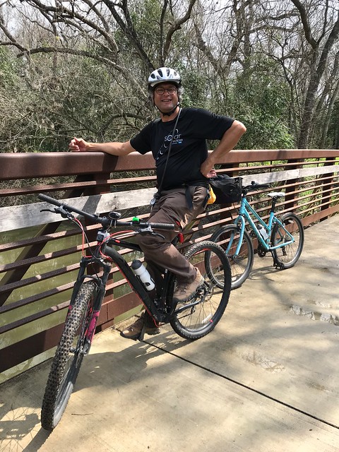 San Antonio - Pierre on Bike at the Bridge