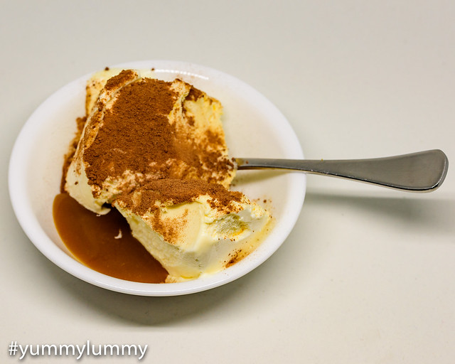 Vanilla ice cream with milo and salted caramel topping