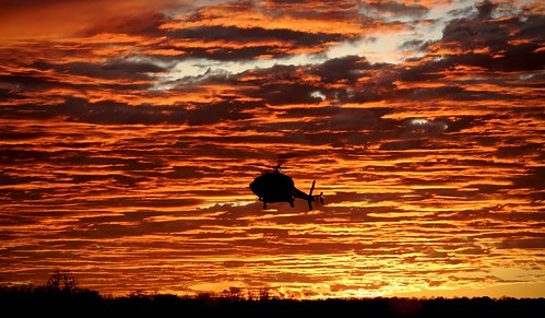 aerial aerialphotography helicopter fromhelicopter baltimore eastcoast maryland md monumentalhelicopters us usa air sky evening tiptonairport sunset skyonfire clouds orange purple red hazy greatsunset orangeglow industry chopper sunsetchopper machinery silhouette explored flickrexplore inexplore cloudy wisps